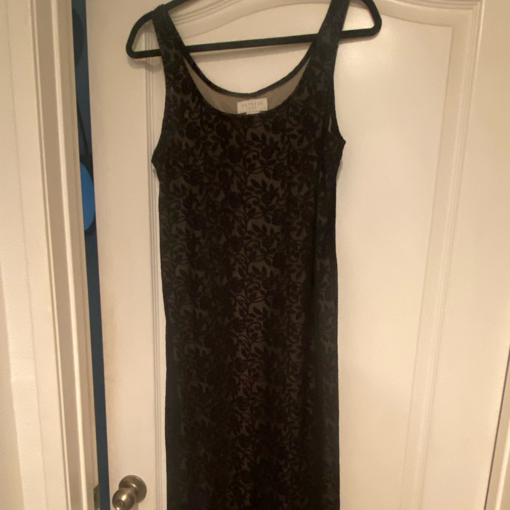 Express dress with Lacey material stretchable with a ivory slip